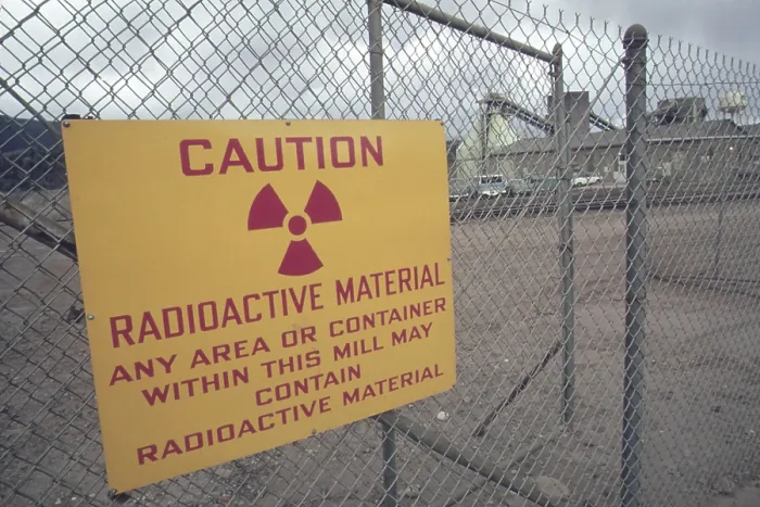 Framed Print : Radiation warning sign at a Union Carbide uranium mill near Rifle Colorado. Many former workers have ongoing health problems from working at the plant. Ca. 1973-75 Framed Print : Radiation warning sign at a Union Carbide uranium mill near Rifle Colorado. Many former workers have ongoing health problems from working at the plant. Ca. 1973-75