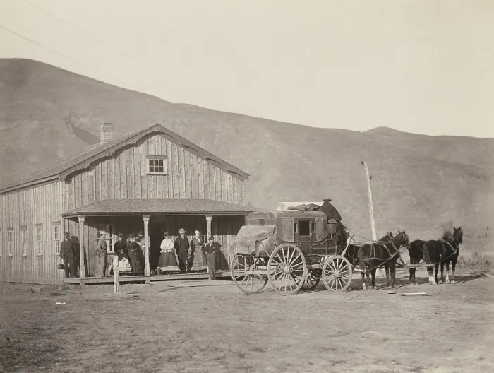 Framed Print : The railroad directors and women in city dress, at an Echo City, Utah, stage coach depot, ca. 1868-69. Echo became a coaling and water station for the UPRR