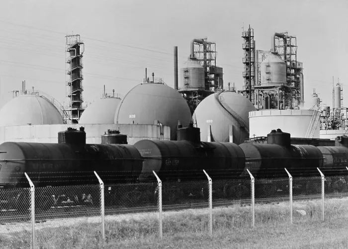 Framed Print : Railroad tank cars at an United States oil refinery to receive gasoline stored in large spherical tanks. Ca. 1944
