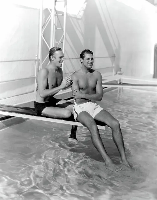 Framed Print : RANDOLPH SCOTT and CARY GRANT poolside at their Santa Monica beach front house, 1935