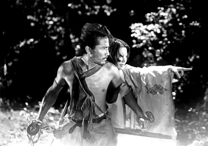Framed Print : RASHOMON, from left: Toshiro Mifune, Machiko Kyo, 1950