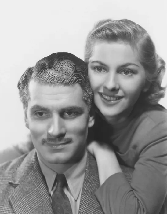 Framed Print : REBECCA, from left: Laurence Olivier, Joan Fontaine, 1940