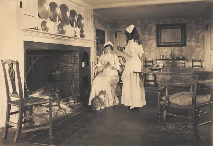 Framed Print : Recreation of a gentile colonial American house with two women in colonial costume. 1913 photo by Wallace Nutting