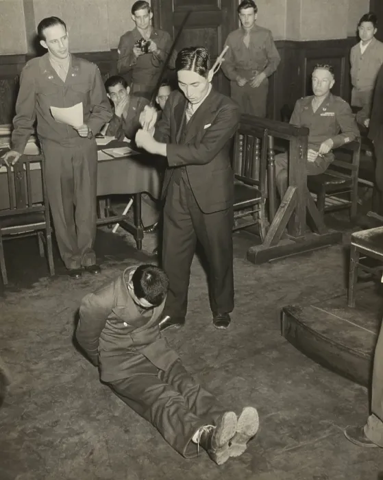Framed Print : Reenactment of the beheading of Lt. Darwin Emry during war crimes trial in Yokohama, Japan. Emry was one of seven survivors of a B-29 shot down over Japan on May 25, 1945