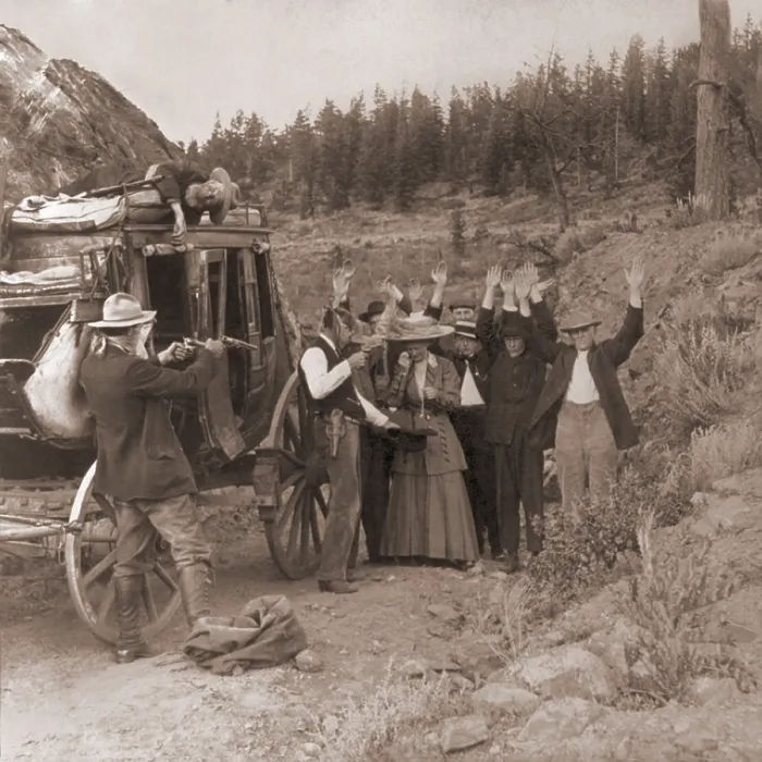 Framed Print : Reenactment of a stage coach robbery by two men, who shot a man who lies on top of the coach and are robbing the passengers. 1911 photo by Edward Tangen Framed Print : Reenactment of a stage coach robbery by two men, who shot a man who lies on top of the coach and are robbing the passengers. 1911 photo by Edward Tangen