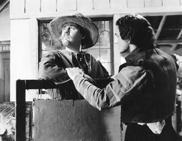 Framed Print : REMBRANDT, from left: Charles Laughton as Rembrandt van Rijn, John Bryning, 1936