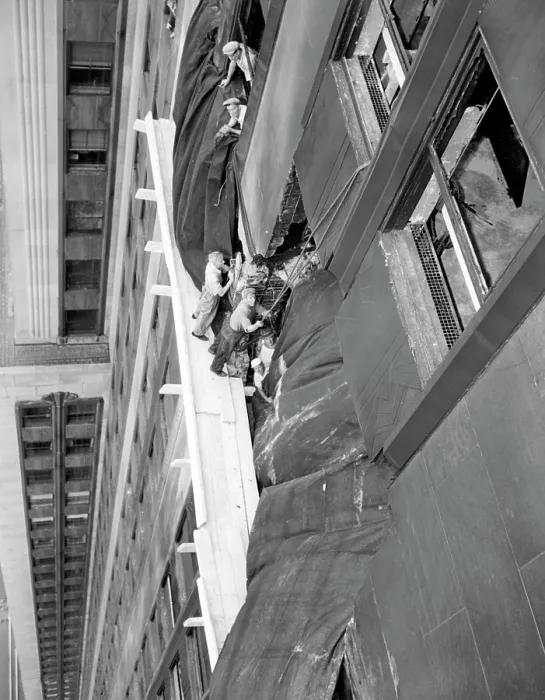 Framed Print : Repairs underway on the Empire State Building after a B-25 Bomber accidentally crashed into the 78th story. New York, New York. July 29, 1945