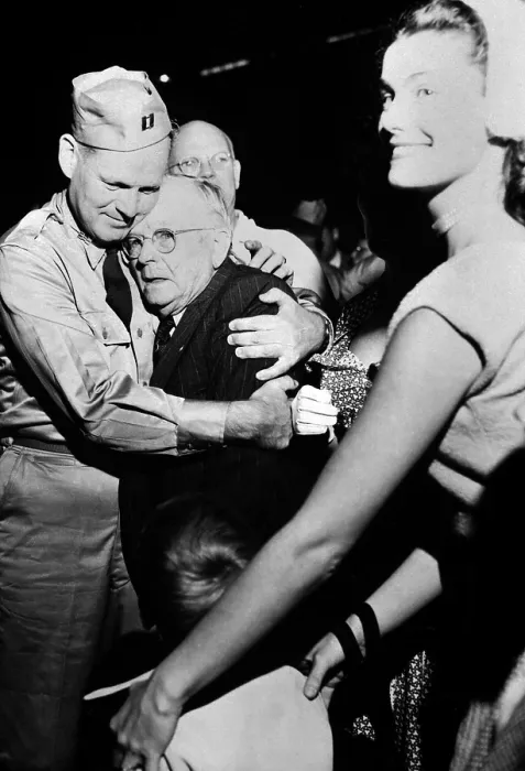 Framed Print : Repatriated POW Capt. Frederick Smith is greeted by his father on Sept. 14, 1953. Sept. 14, 1953. Fort Mason, California. Korean War, 1950-53. (BSLOC_2014_11_182)