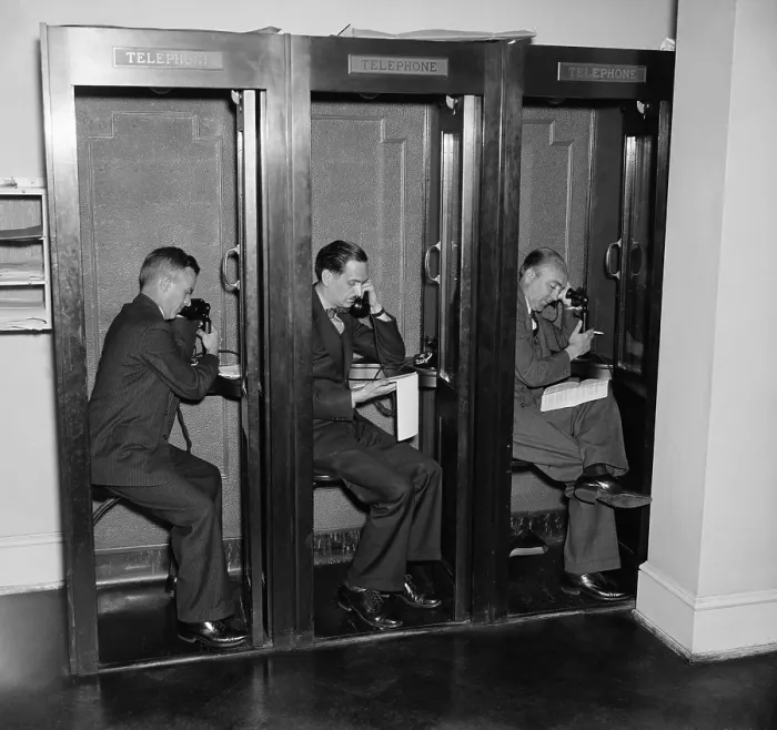 Framed Print : Reporters in telephone booths in White House press room, ca. 1937 Framed Print : Reporters in telephone booths in White House press room, ca. 1937