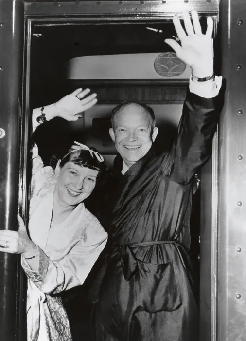 Framed Print : Republican Presidential candidate Dwight Eisenhower and Wife Mamie wave from their campaign train. July-Nov. 1952. They are wearing dressing gowns. - (BSLOC_2014_16_4) Framed Print : Republican Presidential candidate Dwight Eisenhower and Wife Mamie wave from their campaign train. July-Nov. 1952. They are wearing dressing gowns. - (BSLOC_2014_16_4)
