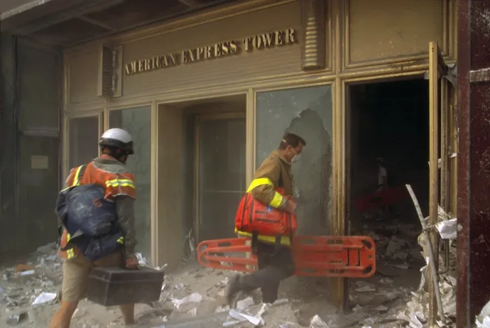 Framed Print : Rescue workers enter the American Express Tower, World Financial Center 3, following 9-11 terrorist attack