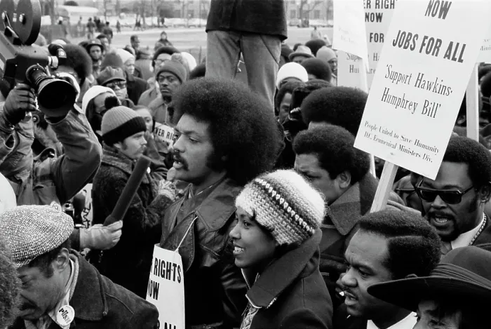 Framed Print : Reverend Jesse Jackson (center, second row), leads a march for jobs around the White House, protesters carry signs advocating support for the Hawkins-Humphrey Bill for employment