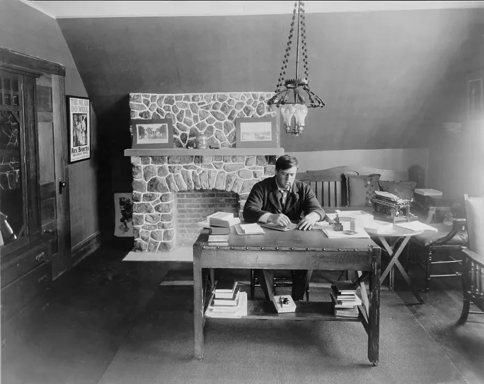 Framed Print : Rex Beach (1877-1949) novelist and playwright, writing at Lake Hopatcong, N.J. in 1913