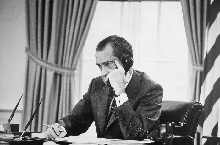 Framed Print : Richard Nixon on the phone in the oval office. Ca. 1969-74 Framed Print : Richard Nixon on the phone in the oval office. Ca. 1969-74