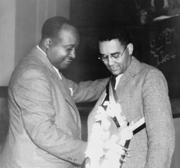 Framed Print : Richard Wright (1908-1960), African-American author of the best selling 1940 novel 'Native Son, 'receiving the Spingarn Award from sociologist, Elmer Carter, in 1941