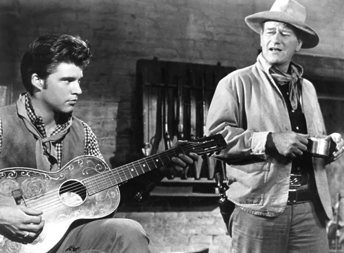 Framed Print : RIO BRAVO, Ricky Nelson, John Wayne, 1959 Framed Print : RIO BRAVO, Ricky Nelson, John Wayne, 1959