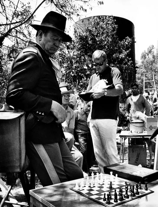 Framed Print : RIO LOBO, John Wayne (far left), on set, 1970.. Courtesy: CSU Archives / Everett Collection Framed Print : RIO LOBO, John Wayne (far left), on set, 1970.. Courtesy: CSU Archives / Everett Collection