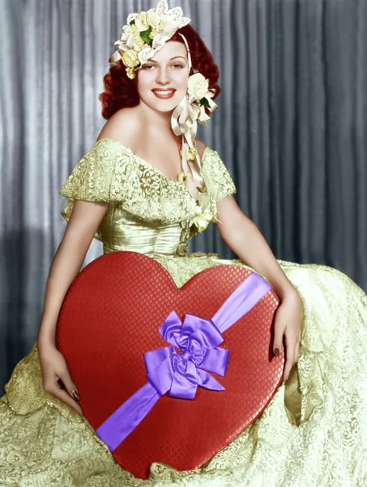 Framed Print : Rita Hayworth poses with a giant heart, ca. 1930s