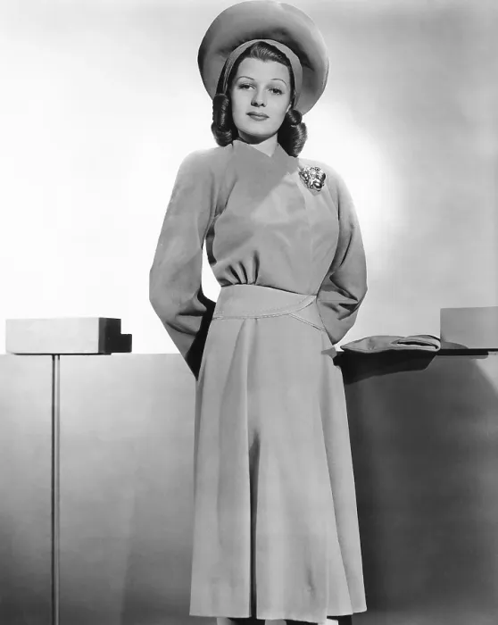 Framed Print : Rita Hayworth, Warner Bros. portrait in a beige wool coat designed by Orry-Kelly, circa 1941 Framed Print : Rita Hayworth, Warner Bros. portrait in a beige wool coat designed by Orry-Kelly, circa 1941