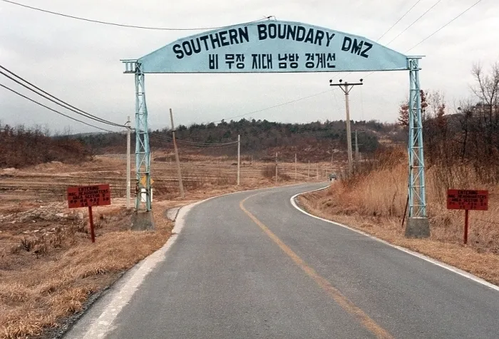 Framed Print : Road sign near the southern boundary of the De-Militarized Zone between North and South Korea. Mar. 28 1984. (BSLOC_2011_12_195) Framed Print : Road sign near the southern boundary of the De-Militarized Zone between North and South Korea. Mar. 28 1984. (BSLOC_2011_12_195)