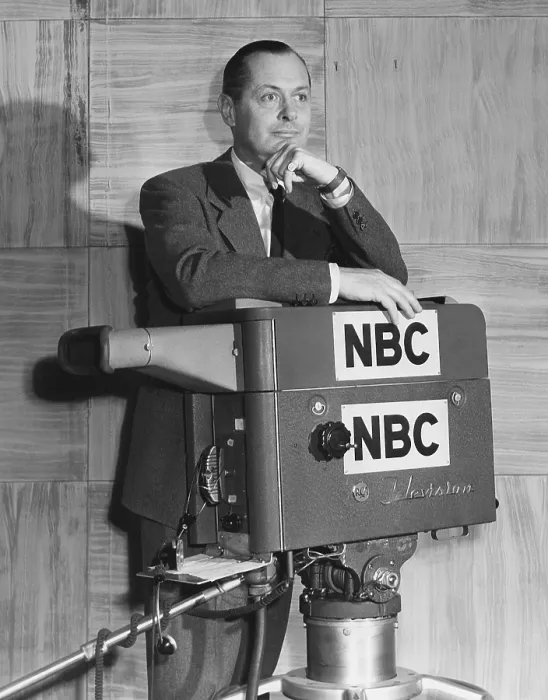 Framed Print : ROBERT MONTGOMERY PRESENTS, Robert Montgomery (host), posing with TV camera, 1950-1957