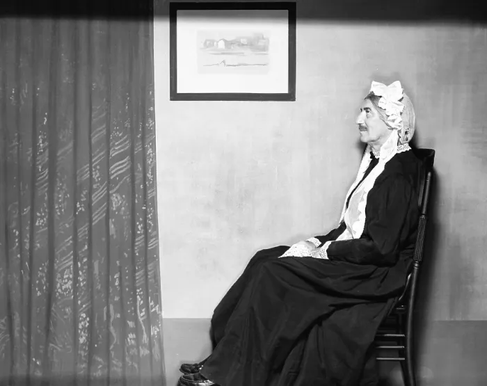 Framed Print : On his rocker, instead of off, is Groucho Marx posing as Whistler's Mother. 1960. (CSU_2015_11_1482)