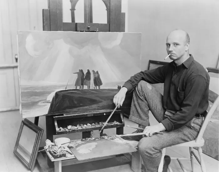Framed Print : Rockwell Kent (1882-1971), American realist painter at his easel painting THE WRECK. 1929 Framed Print : Rockwell Kent (1882-1971), American realist painter at his easel painting THE WRECK. 1929