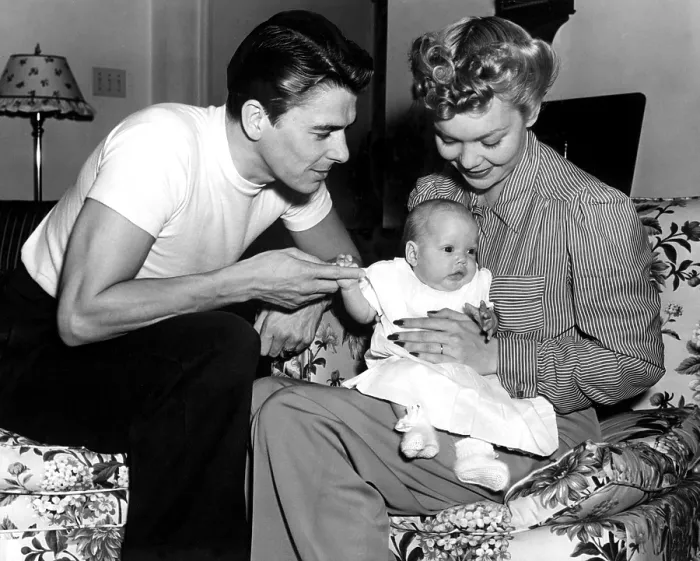 Framed Print : Ronald Reagan, Maureen Reagan, Jane Wyman at home, 4 / 26 / 41. Courtesy: CSU Archives  /  Everett Collection