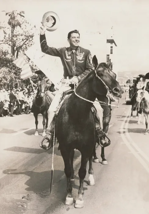 Framed Print : Ronald Reagan, newly elected Governor of California, riding a horse in a parade. Dec. 1966. (BSLOC_2015_14_74)