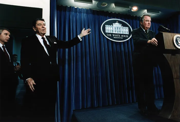 Framed Print : Ronald Reagan. President Reagan motioning to Attorney General Ed Meese during a White House Press Briefing on Iran-Contra. The White House, Washington, D.C. 1986 Framed Print : Ronald Reagan. President Reagan motioning to Attorney General Ed Meese during a White House Press Briefing on Iran-Contra. The White House, Washington, D.C. 1986