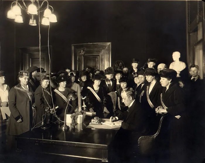 Framed Print : A room full women wearing Votes for Women banners, witness Governor Edwin P. Morrow signing Kentucky's ratification of the 19th Amendment