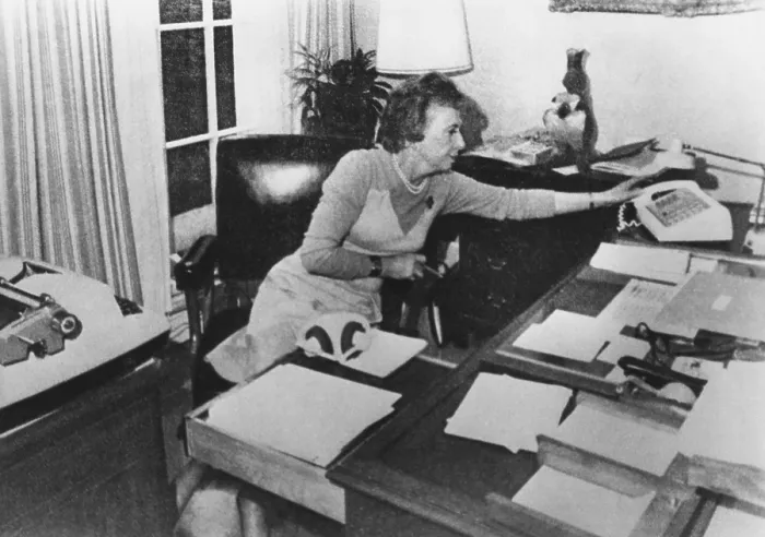 Framed Print : Rosemary Woods, President Nixon's personal secretary, demonstrating the Rose Mary Stretch
