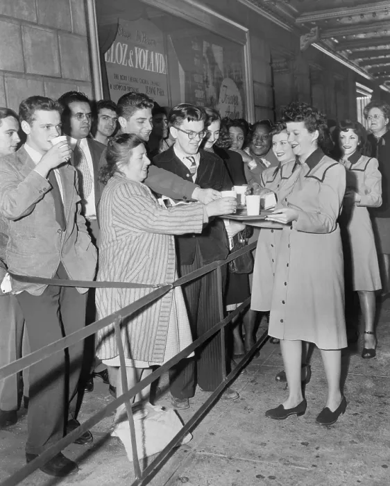 Framed Print : Roxy Theater usherettes dispense coffee and doughnuts to movie patrons at the premiere of Forever Amber'. New York City, 1947. - (BSLOC_2014_17_127)
