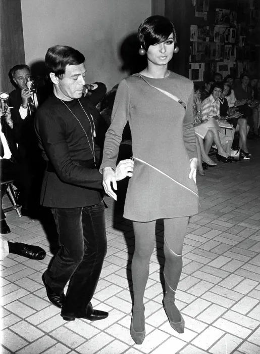 Framed Print : Rudi Gernreich dressing a model at a New York fashion show, 5 / 23 / 68. Courtesy: CSU Archives  /  Everett Collection