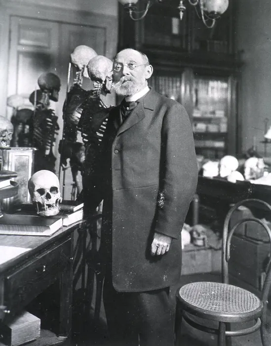 Framed Print : Rudolph Virchow 1821-1902 German pathologist physician and anthropologist standing with human skeletons. Ca. 1890