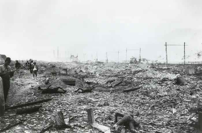 Framed Print : Ruins of Nagasaki, Japan, after atomic bombing of August 9, 1945. Government officials walk amid radioactive debris and burnt corpses on August 10, 1945. Photo by Yosuke Yamahata