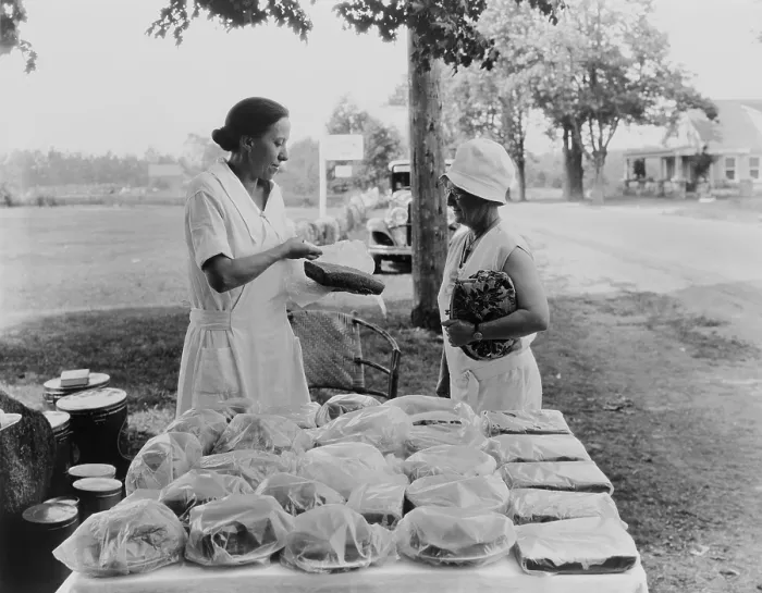 Framed Print : Rural woman selling baked goods by roadside, ca. 1925-30. The photo was created by the US Department of Agriculture, to propose ways farmers could increase their cash incomes