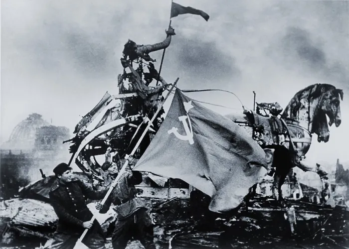 Framed Print : Russian soldiers raise the Soviet Flag next to the battered sculptures of the Brandenburg Gate in the final European battle of World War II. May 2, 1945 photo by Evgenii Khaldei