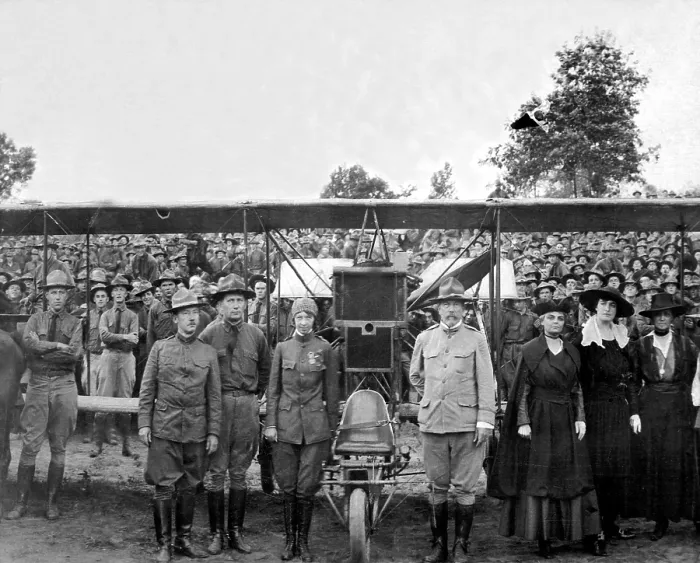 Framed Print : Ruth Law, was the only woman allowed to wear the Army-Air Force uniform for nonmilitary purposes. She is with members of the 29th Division, Camp McClellan, Alabama. Ca. 1918