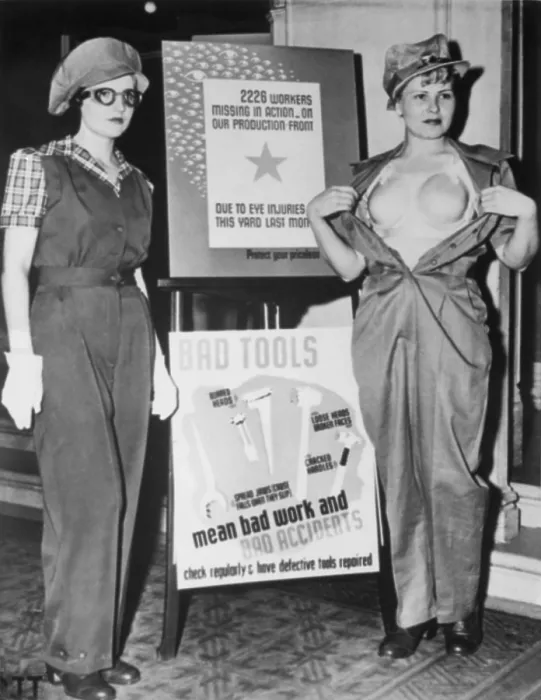 Framed Print : SAF-T-BRA for women war workers at Marinship Corporation. Underneath the uniform at left, is a protective plastic bra modeled on the right Framed Print : SAF-T-BRA for women war workers at Marinship Corporation. Underneath the uniform at left, is a protective plastic bra modeled on the right