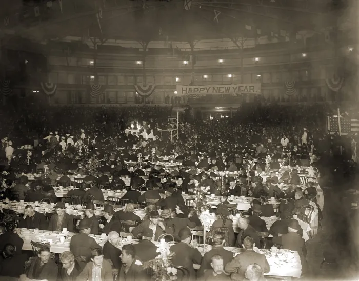 Framed Print : Salvation Army's New Year's Dinner in a large auditorium was attended mostly by men, but also women, children, and African American families, 1910 Framed Print : Salvation Army's New Year's Dinner in a large auditorium was attended mostly by men, but also women, children, and African American families, 1910