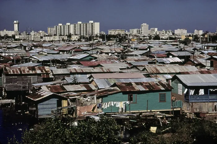 Framed Print : San Juan Puerto Rico. Modern buildings contrast with shanties along the Martin Pena Canal. Feb. 1973 Framed Print : San Juan Puerto Rico. Modern buildings contrast with shanties along the Martin Pena Canal. Feb. 1973