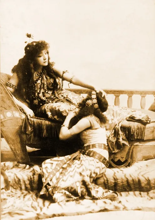 Framed Print : Sarah Bernhardt (1844-1923), French, actress in the role of Cleopatra, reclining with her hand on head of seated woman. Ca. 1891 Framed Print : Sarah Bernhardt (1844-1923), French, actress in the role of Cleopatra, reclining with her hand on head of seated woman. Ca. 1891
