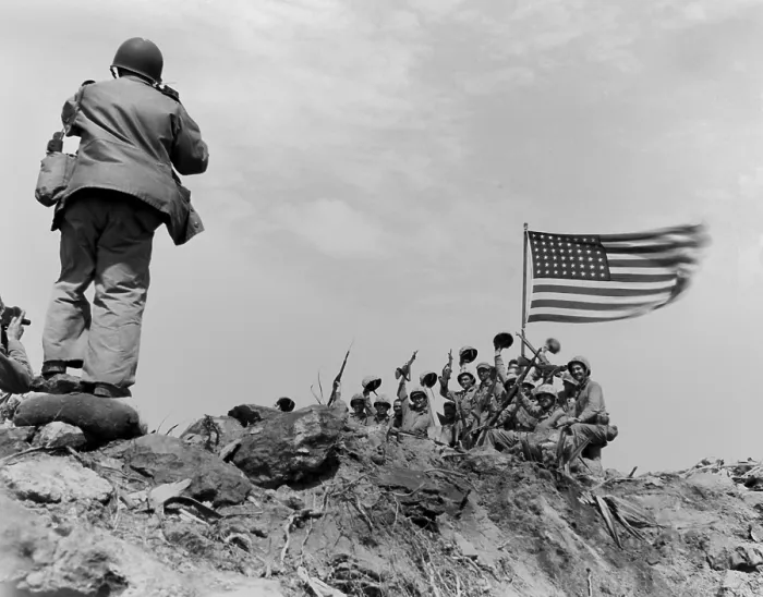 Framed Print : Scene after the second flag raising, on Iwo Jima's Mount Suribachi, Feb. 23, 1945. At left are the photographers, including Joe Rosenthal, photograph the cheering Marines