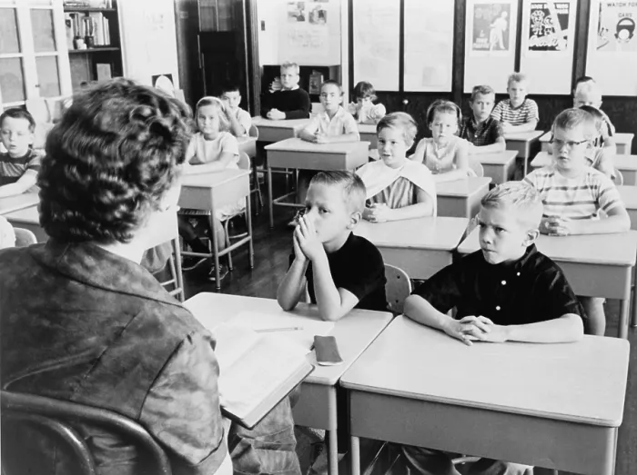 Framed Print : Second grade students listen as their teacher, reads a passage from the Bible in 1962 to substitute for the school prayers that were declared unconstitutional by the U.S
