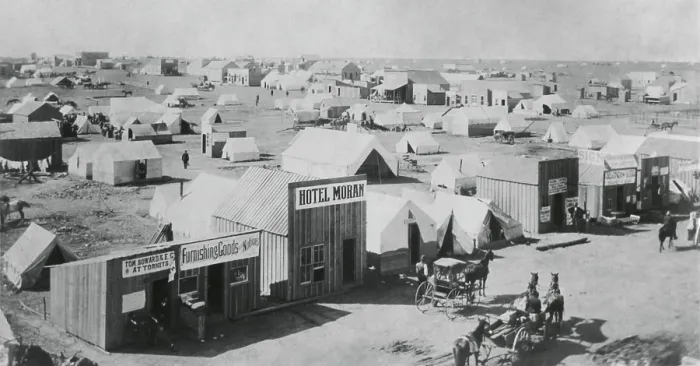 Framed Print : A section of Guthrie, Oklahoma with a combination of wood buildings and tents, at the time of the 1893 Land Rush