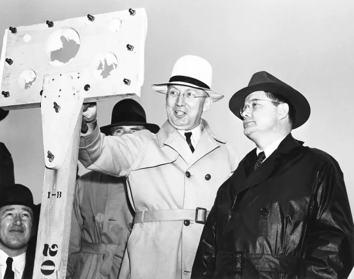 Framed Print : Sen. Chan Gurney (center), and Col. K.F. Adamson (right) after GLMITE bomb test