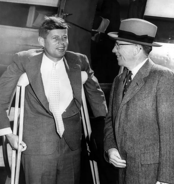 Framed Print : Senator John F. Kennedy, on crutches from a wartime back injury, Massachusetts Lieutenant Governor Robert F. Murphy, at Logan Airport in Boston, Massachusetts, c. 1959 Framed Print : Senator John F. Kennedy, on crutches from a wartime back injury, Massachusetts Lieutenant Governor Robert F. Murphy, at Logan Airport in Boston, Massachusetts, c. 1959