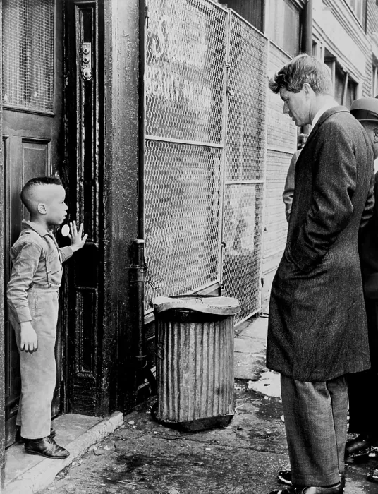 Framed Print : Senator Robert Kennedy (1925-1968), discusses school with one of his young constituents, Ricky Taggart of 733 Gates Avenue in Brooklyn, New York. February 4, 1966