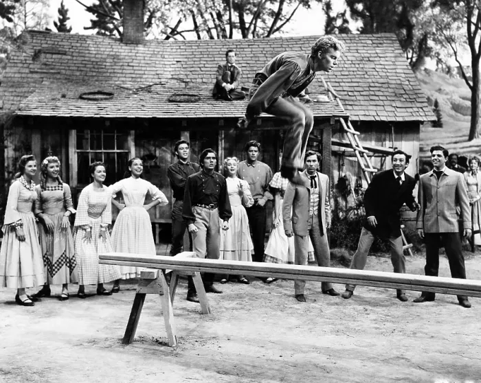 Framed Print : SEVEN BRIDES FOR SEVEN BROTHERS, (aka 7 BRIDES FOR 7 BROTHERS), Russ Tamblyn, (leaping), standing, from left, Norma Doggett, Ruta Lee, Virginia Gibson, Betty Carr